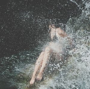 Woman swimming in sea