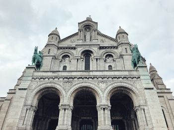 Low angle view of church against sky