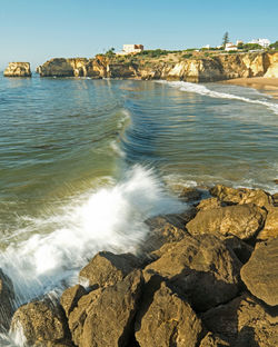 Scenic view of sea against clear sky