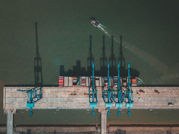 Aerial view of crane at harbor