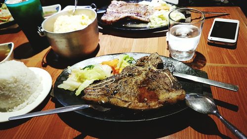 Close-up of served food on table