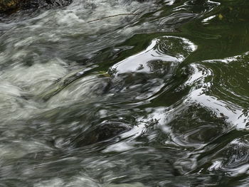 Full frame shot of water flowing in river