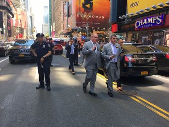 People walking on city street