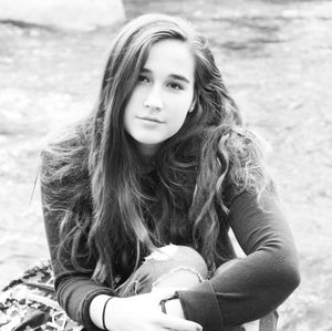 Portrait of beautiful young woman with long hair