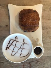 High angle view of coffee cup on table