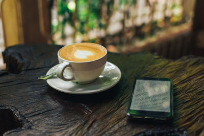 Coffee cup on table