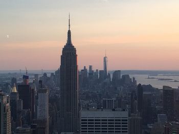 View of cityscape against sky during sunset