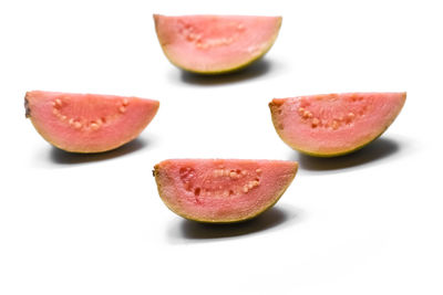 Close-up of fruits against white background