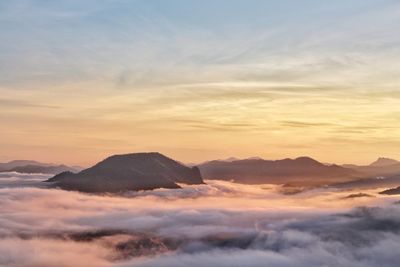 Scenic view of mountains against sky during sunset