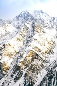 Scenic view of snow covered mountains