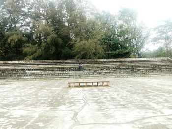 Empty bench in park