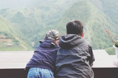 Rear view of couple on mountain