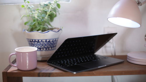 Coffee cup on table at home