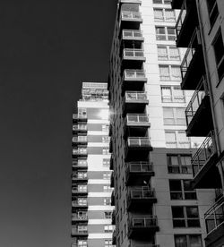 Low angle view of buildings against clear sky