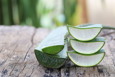 Close-up of aloe vera on wooden table