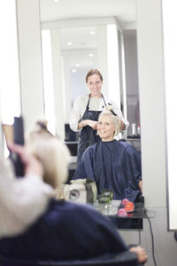 Woman having haircut, stockholm, sweden