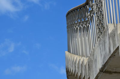 Low angle view of building against blue sky