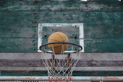 Basketball hoop against wall