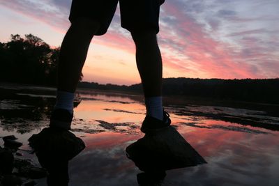 Silhouette of people at sunset