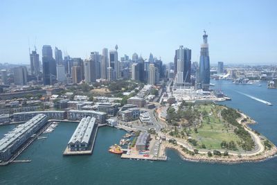 High angle view of city and buildings at waterfront