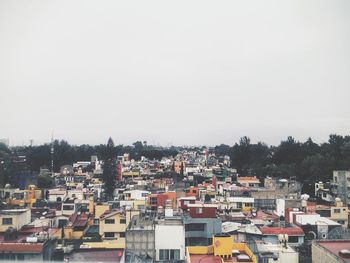 Cityscape against clear sky