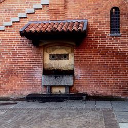 Low angle view of brick wall