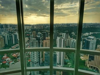 View of cityscape through window