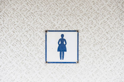 Toilet sign for woman, sweden