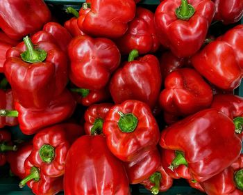 Full frame shot of red bell peppers at market stall