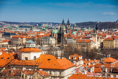 Charles bridge and prague city old town seen from petrin hill in a beautiful early spring day