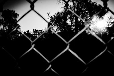 Chainlink fence seen through chainlink fence