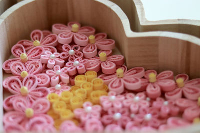 Close-up of pink flowers on table