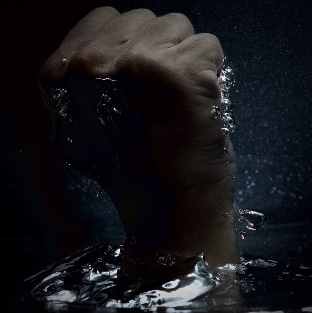 CLOSE-UP OF WOMAN HAND WITH WATER
