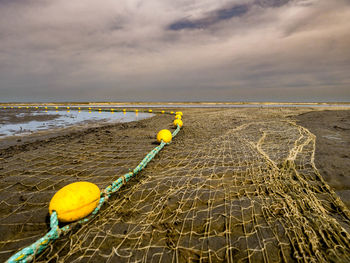 Fishnet layed out at the beach waiting for high tide