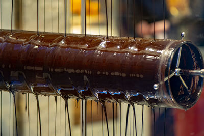 Close-up of machine in container