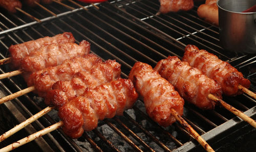 Close-up of meat on barbecue grill