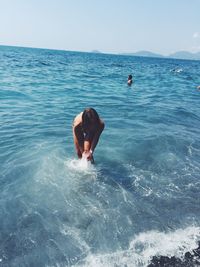 Young woman enjoying in sea