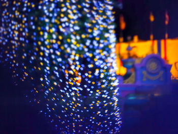 Close-up of illuminated lights at night