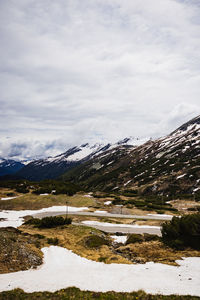 Scenic view of snowcapped mountains against sky