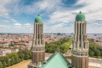 Panoramic view of buildings against sky in city