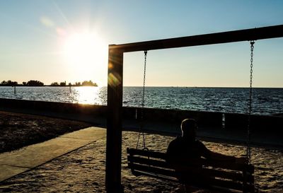 Scenic view of sea against sky at sunset