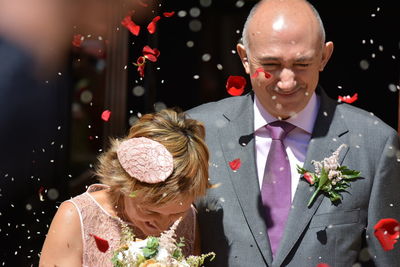 Close-up of happy mature bride an groom during wedding