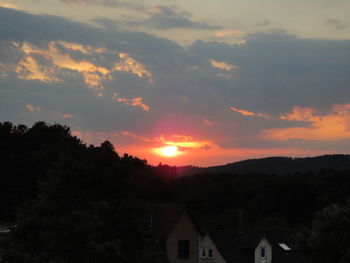 Scenic view of mountains at sunset