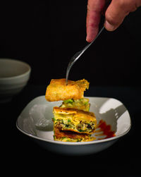 Close-up of person holding food