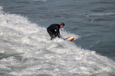 Man surfing in sea