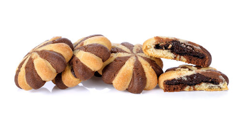 Close-up of cookies against white background