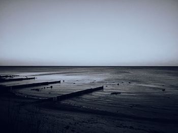 Scenic view of sea against clear sky