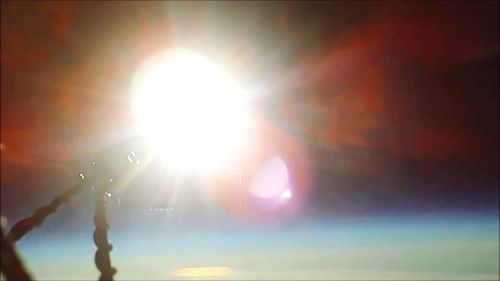 Close-up of illuminated sun during sunset