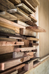 Close-up of wood paneling by wall at home