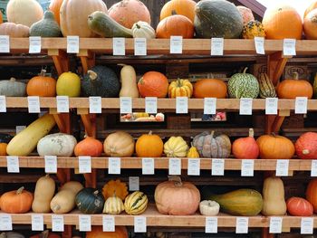 Close-up of pumpkins for sale at market stall